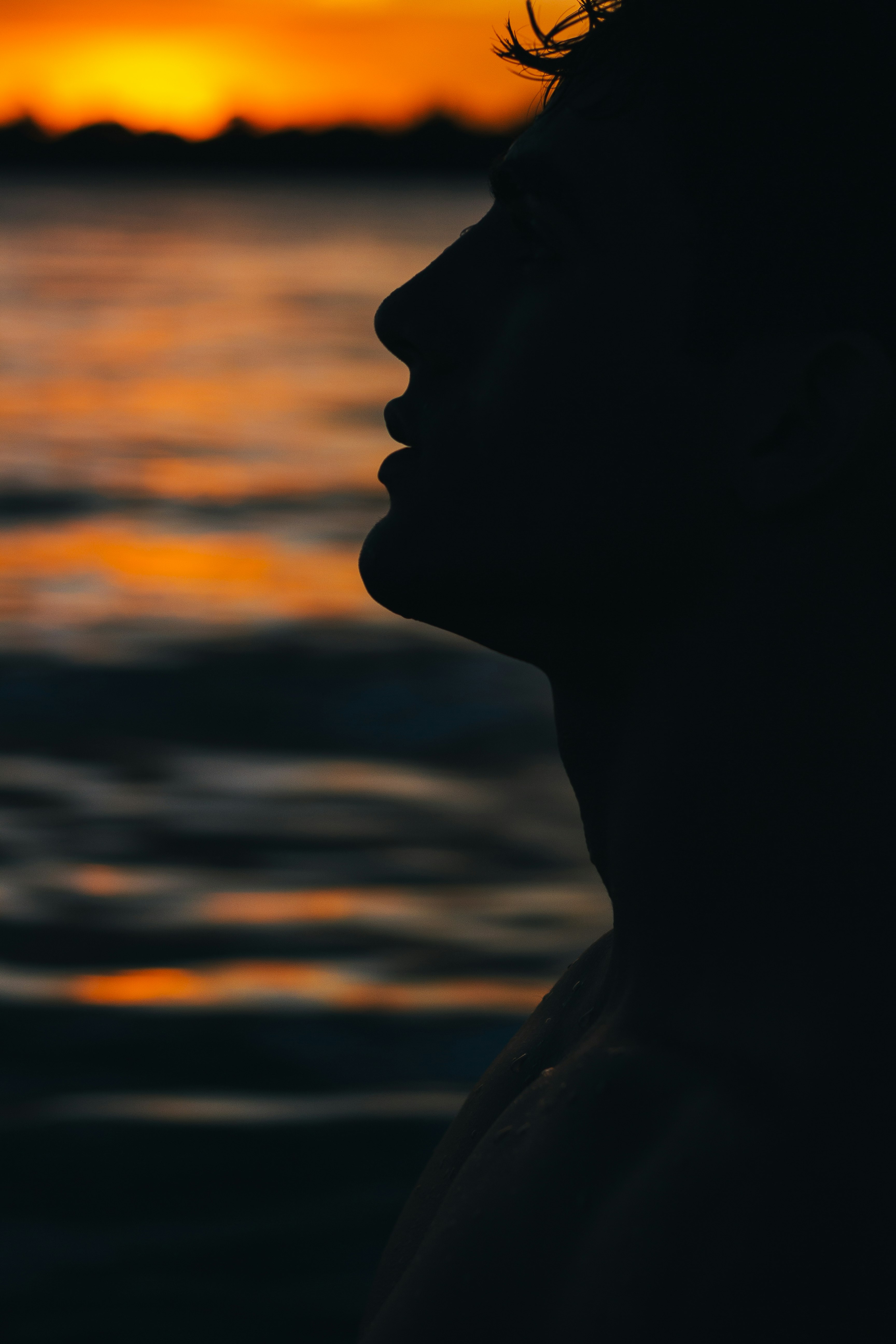 silhouette of woman during sunset